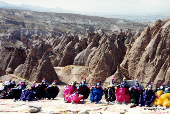 Dolls and Cappadocia landscape - Turkey