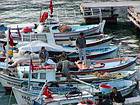Fishermen in the old port, Antalya, Turkey.